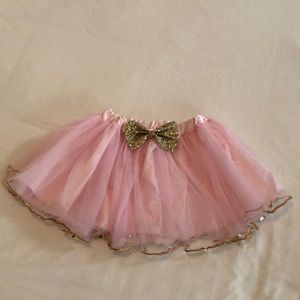 Girls pink tutu with gold sparkle now detail